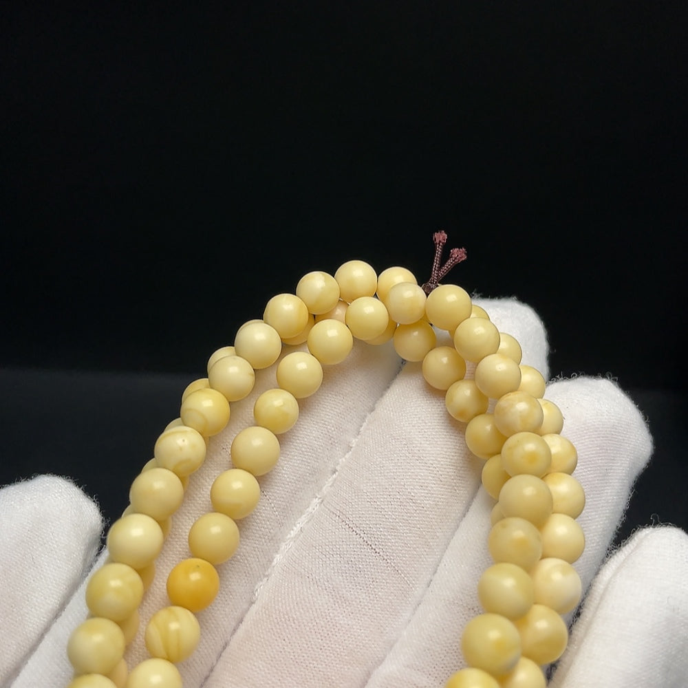 Huiliu Amber Honey Bead Necklace with 6.2mm amber beads, natural honey color, certified by HUILIU HQ.