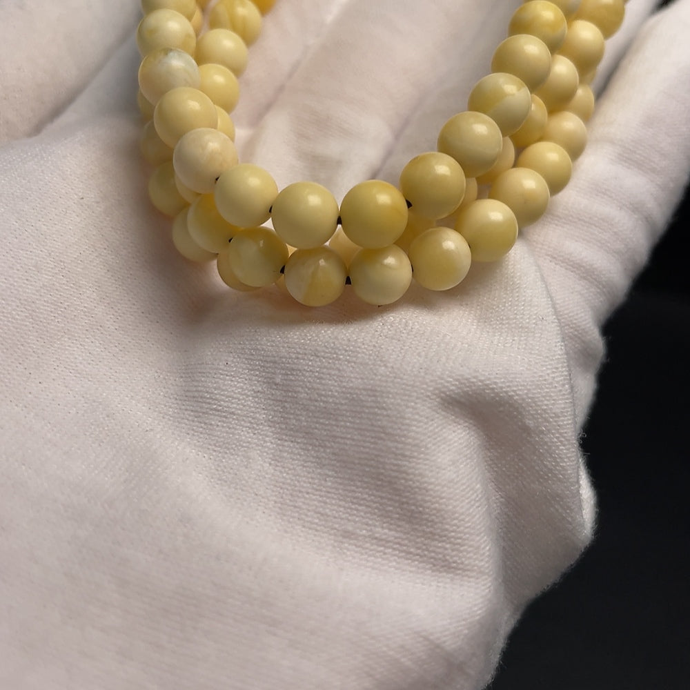 Huiliu Amber Honey Bead Necklace with 6.2mm amber beads, natural amber color, certified by HUILIU HQ.