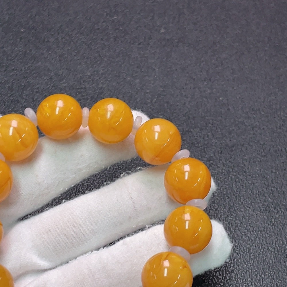 Amber Honey Wax Bracelet by HUILIU HQ, with visible partial repairs, 16mm size, weighing approx. 31.9g, featuring mixed stones