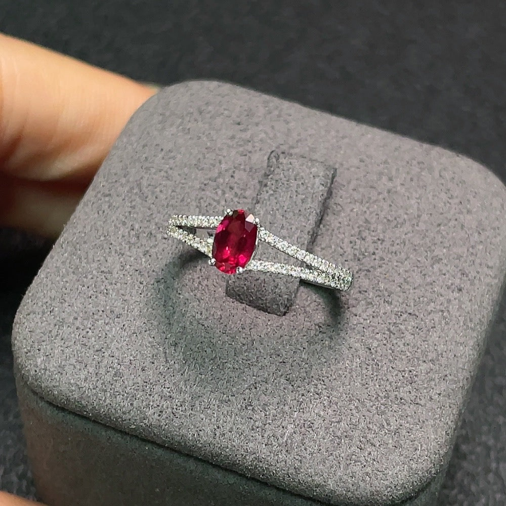 HUILIU HQ 18K ruby ring with diamond accents, size 12, featuring a 5.9x3.2mm ruby gemstone and sparkling diamond details.