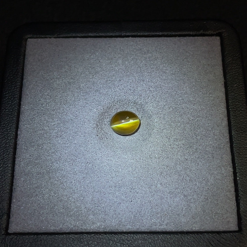 Chrysoberyl loose gemstone from HUILIU HQ, approximately 1.74 carats, showcasing its vibrant color and clarity.