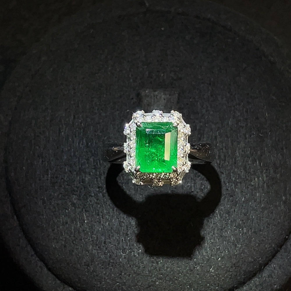 Emerald ring by HUILIU HQ featuring 18K gold, enhanced clarity emerald, diamond accents, size 13, total weight 4.43g.
