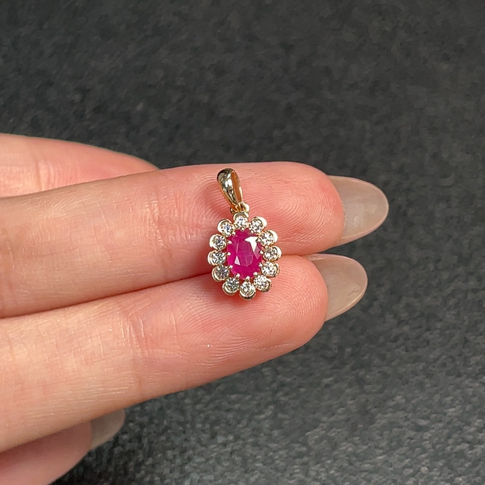 Ruby pendant in 18K gold with diamond accents, showcasing a vibrant gemstone and elegant design by HUILIU HQ.
