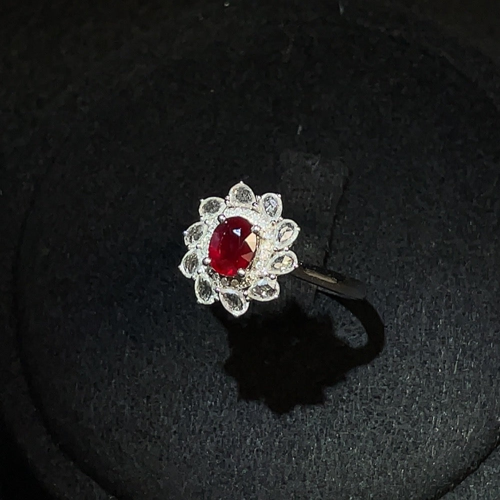 HUILIU HQ ruby ring with diamond accents in 18k gold, featuring a central ruby gemstone and minimal diamond accents.
