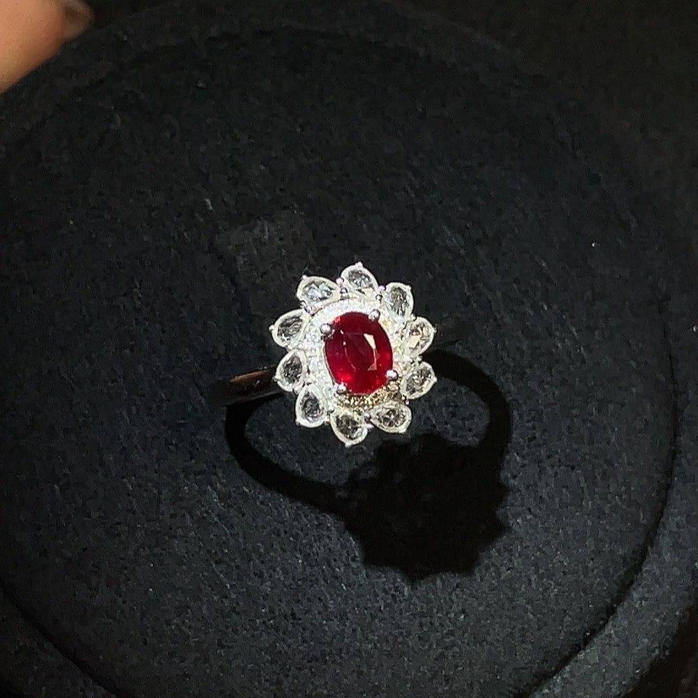 HUILIU HQ ruby ring with diamond accents in 18k gold, featuring a central ruby gemstone and minimal sparkling accent stones