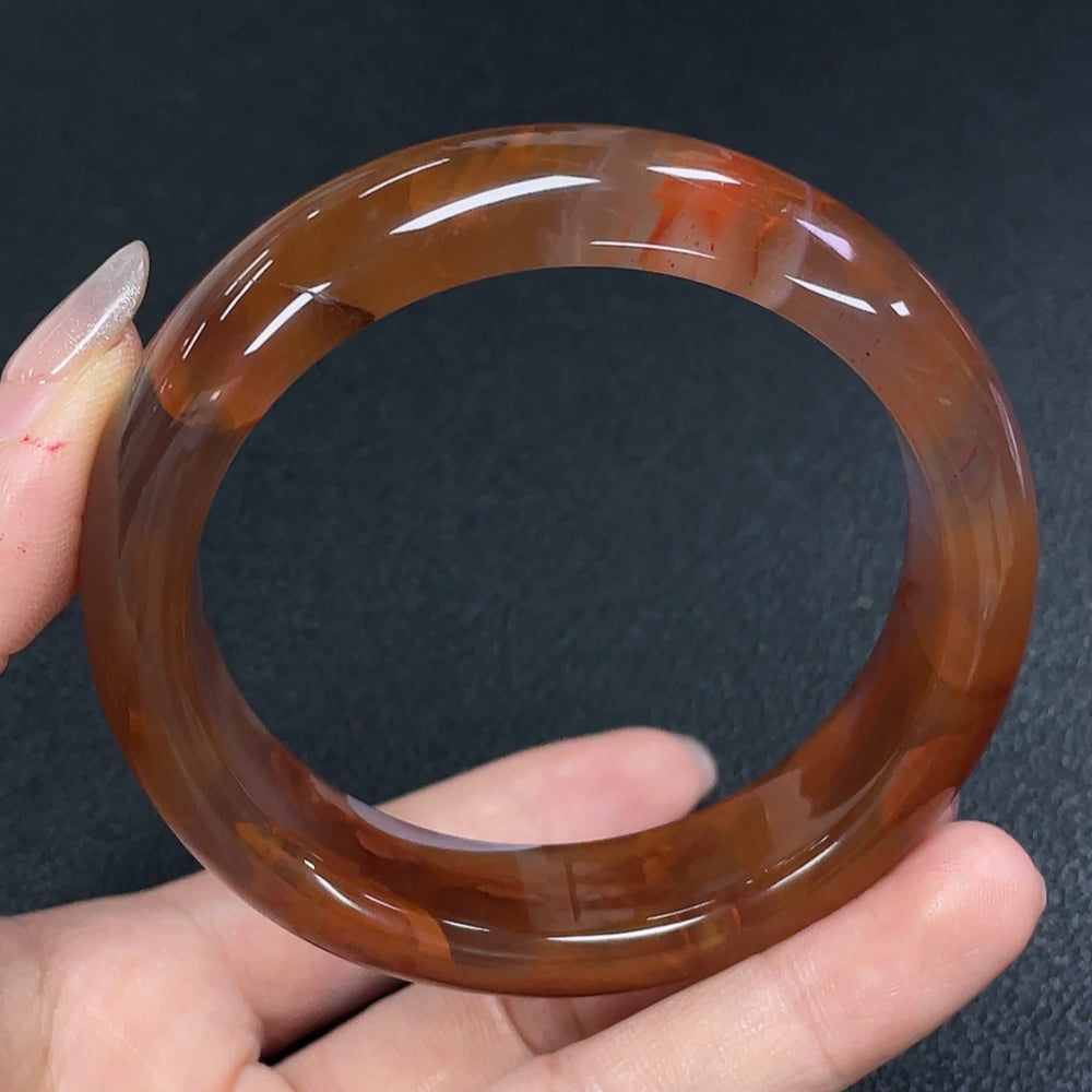 South Red Agate gemstone bracelet with visible organic matter, crafted by HUILIU HQ, showcasing natural gemstone features.