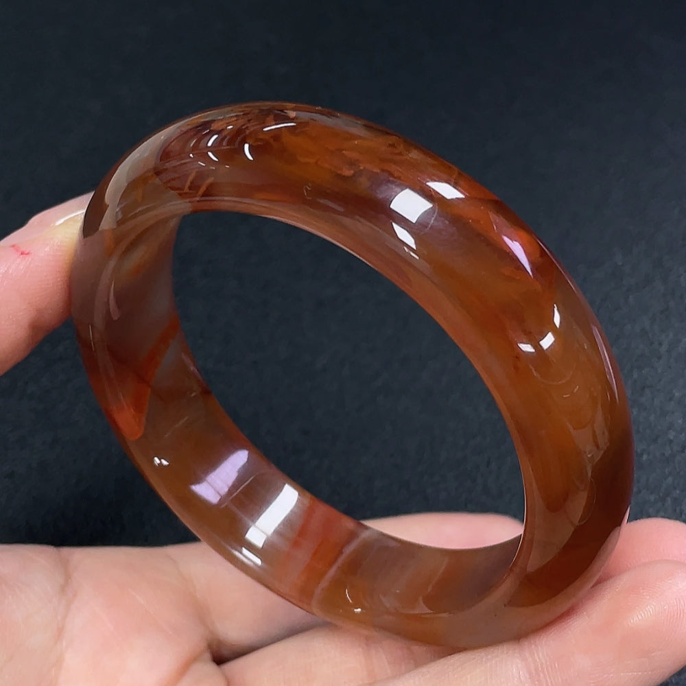 South Red Agate gemstone bracelet by HUILIU HQ featuring visible organic matter and natural gemstone beads.