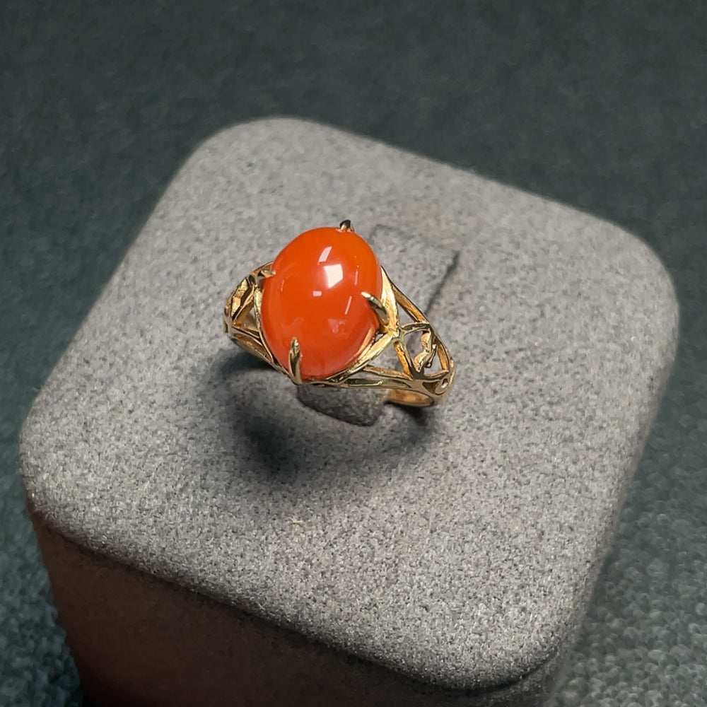 South Red Agate gemstone ring by HUILIU HQ featuring a polished red agate stone in a silver setting.