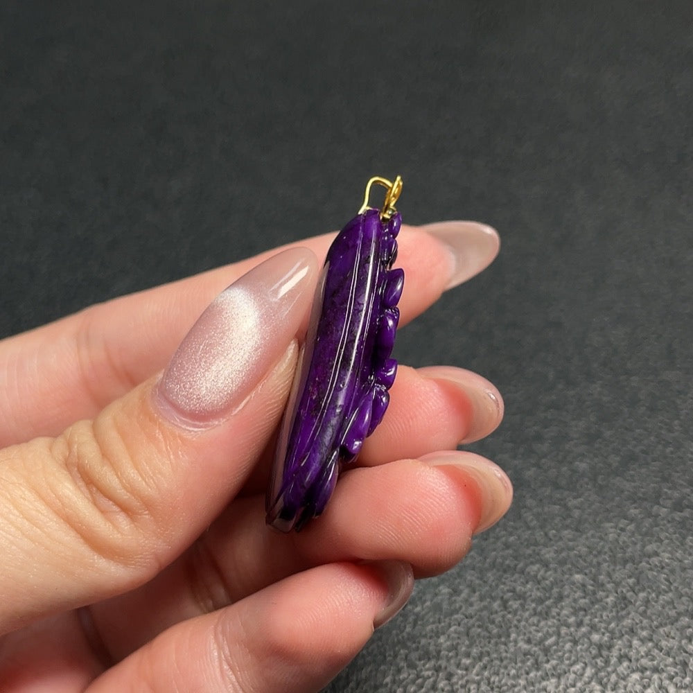 Huiliu certified Sugilite gemstone pendant with mineral inclusions and non-natural accent stones, showcasing vibrant purple and mineral details.