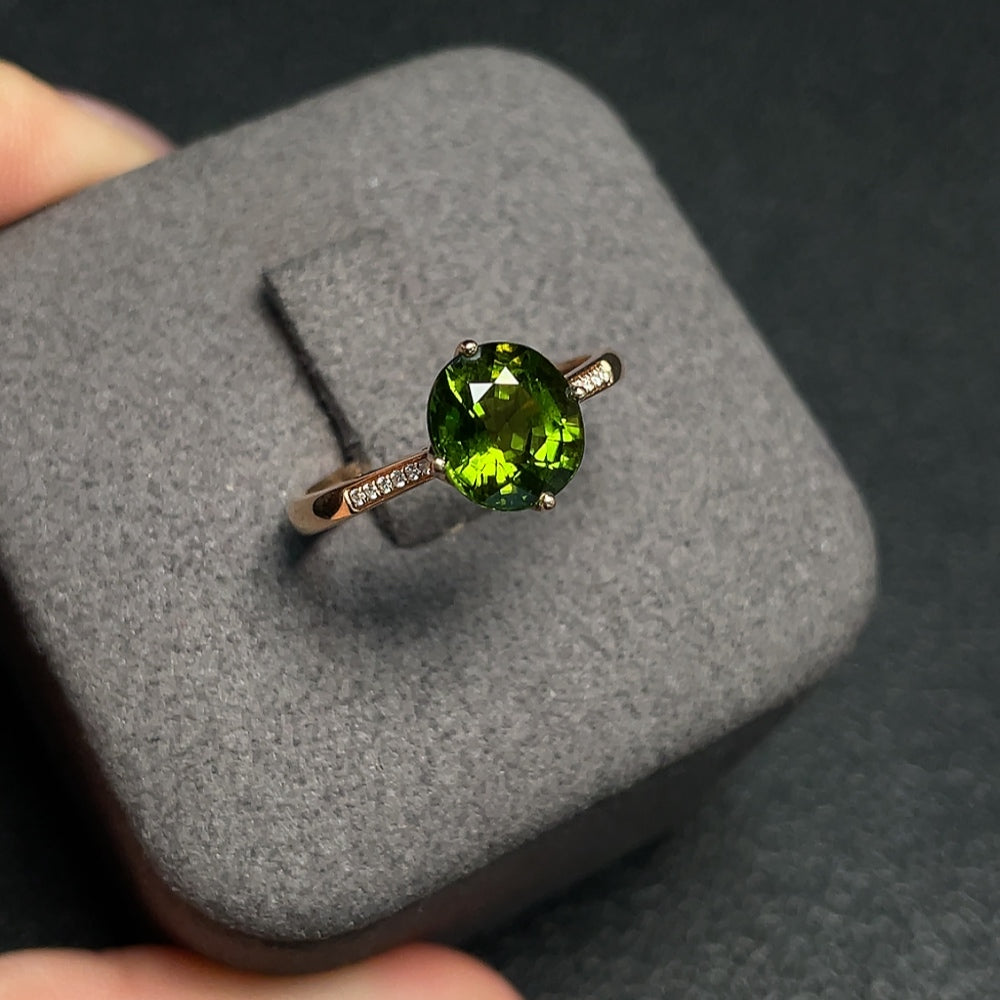 Huiliu certified gemstone tourmaline ring with diamond accents, 7.7x6.8mm, showcasing a vibrant gemstone set in a stylish band.