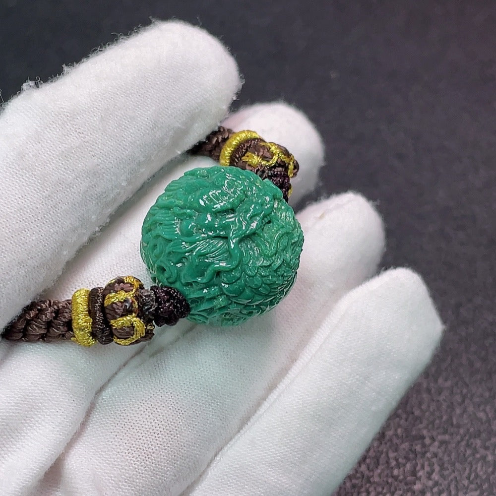Turquoise gemstone pendant with rope, approx. 18g, measuring 21.3x20.4mm, from HUILIU HQ, featuring vibrant blue gemstone and cord.