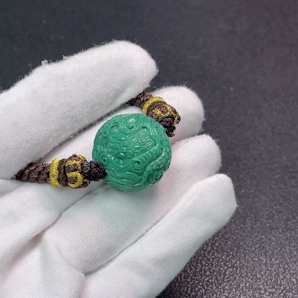 Turquoise gemstone pendant with rope, approximately 18.03g, measuring 21.3x20.4mm, from HUILIU HQ.