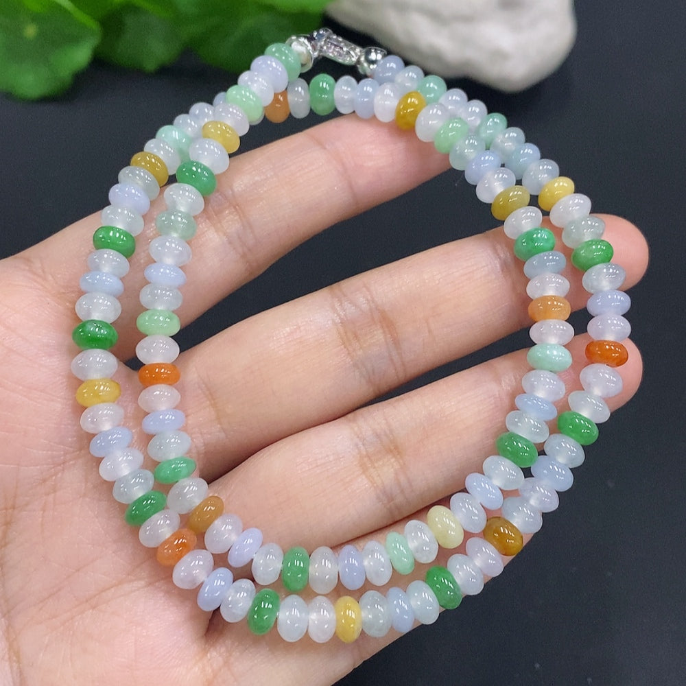 HUILIU HQ Jade gemstone with an undetermined color origin, showcasing its smooth, polished surface and natural luster.