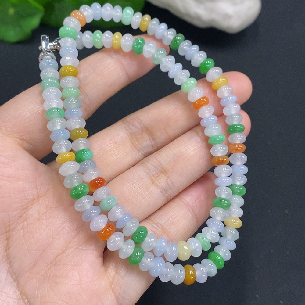 HUILIU HQ Jade gemstone with an undetermined color, showcasing a smooth, polished surface and natural translucency.