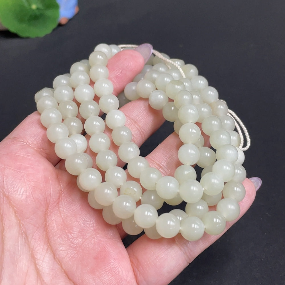 Hetian jade bead necklace by HUILIU HQ featuring 7.7mm jade beads, total weight approximately 86g, showcasing smooth, polished stones.