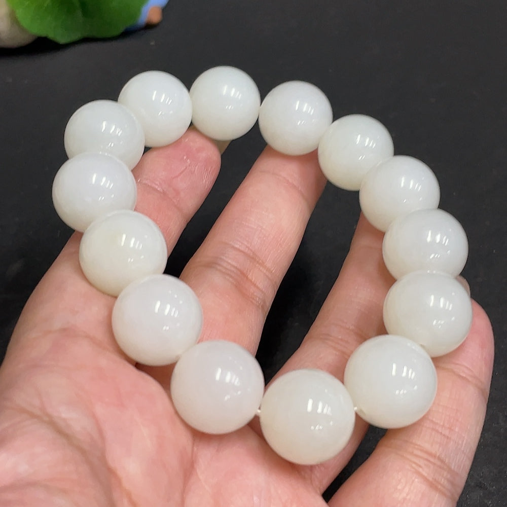 Huiliu certified Hetian Jade bracelet with 14.9mm smooth round jade beads, showcasing polished green and white jade stones.