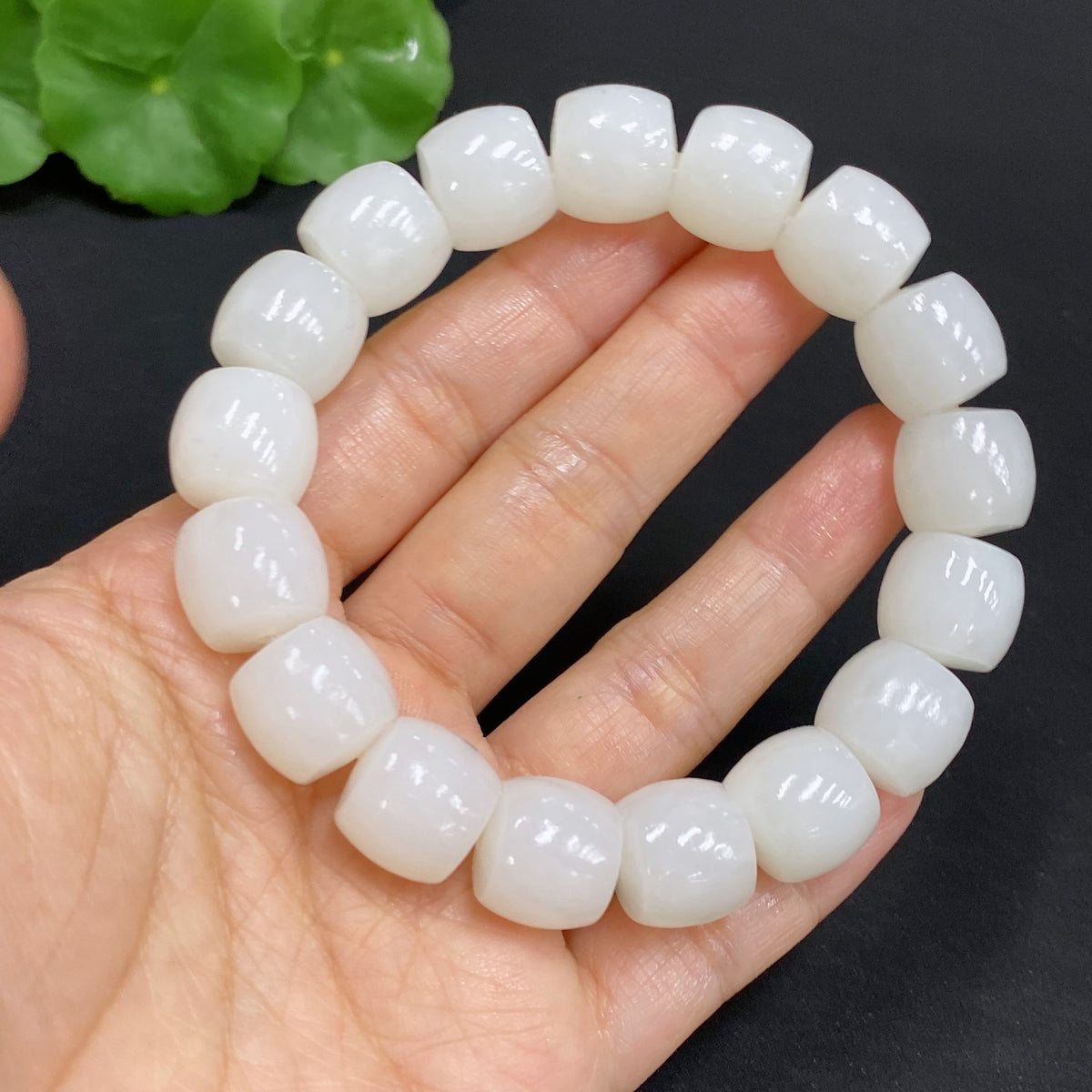 Huiliu HQ Hetian Jade bracelet with 12.7mm beads, weighing approximately 65.2g, showcasing smooth, polished green jade stones.