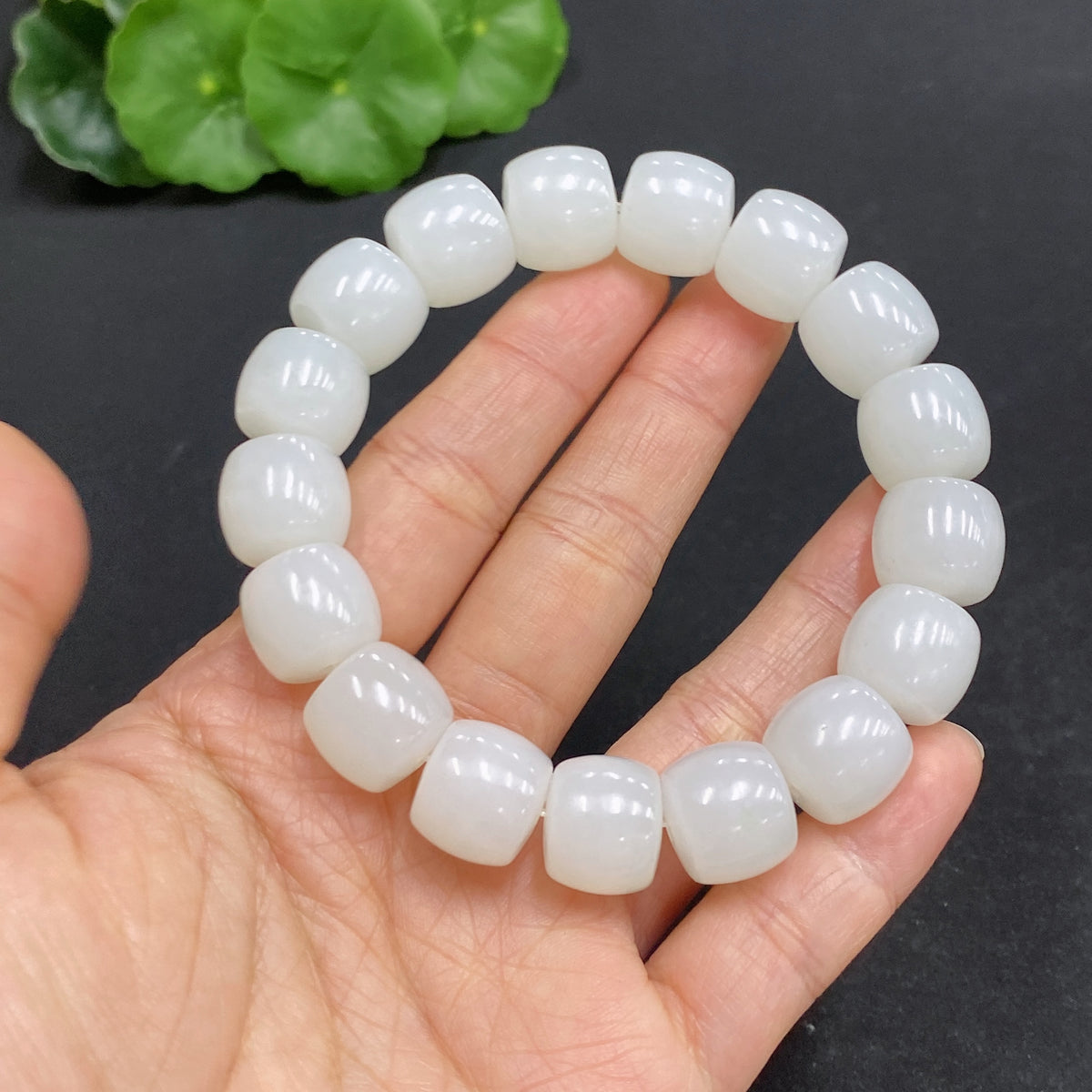 Hetian jade bracelet with 12.8mm beads, crafted by HUILIU HQ, weighing approximately 62.3g, featuring smooth, polished jade stones.