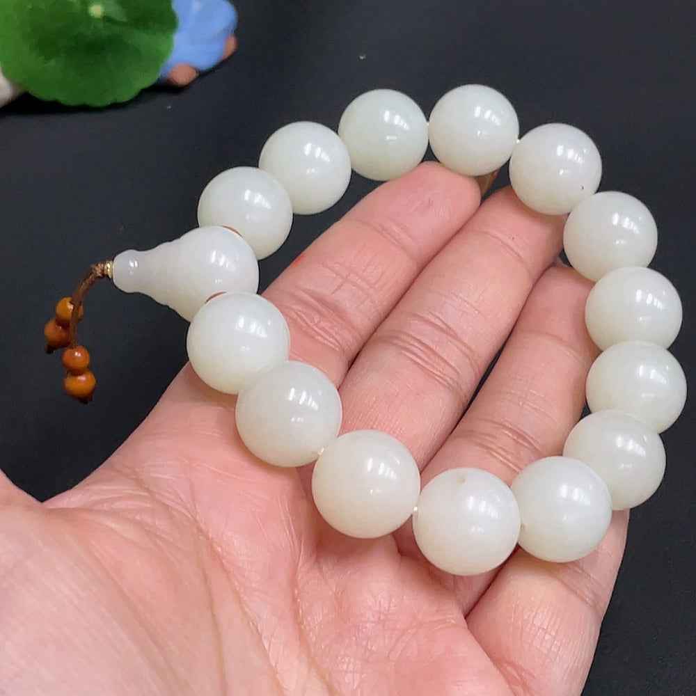 Huiliu HQ Hetian Jade bracelet with 14.4 mm beads, approximately 73.4g, featuring non-Hetian jade beads and natural stone appearance.