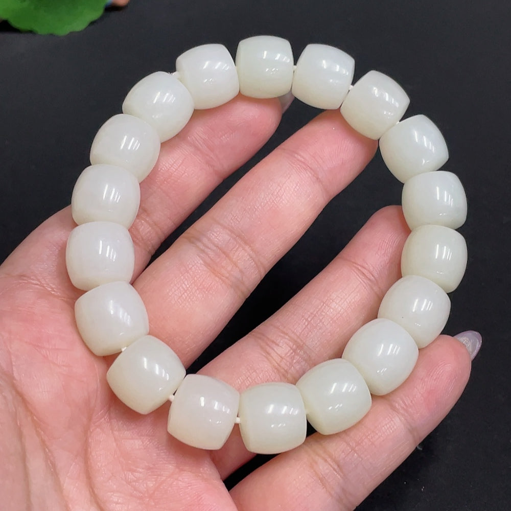 Huiliu HQ Hetian Jade bracelet with 12.9mm beads, total weight 65g, showcasing smooth, polished green jade stones.