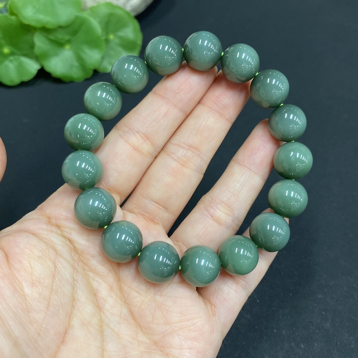 Hetian Jade Jasper bracelet with 11.6mm beads, crafted by HUILIU HQ, showcasing smooth, polished jade stones in natural hues.