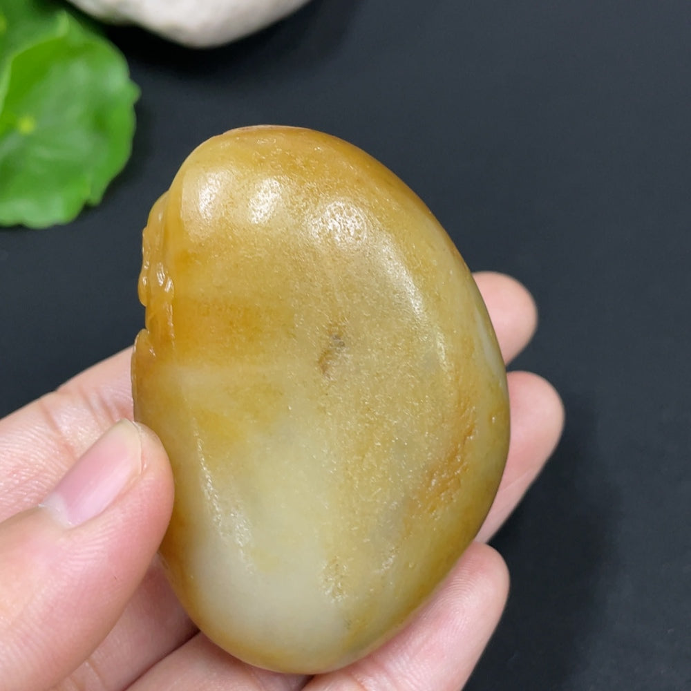 Huiliu HQ Hetian Jade pendant featuring a Buddha statue, with undetermined skin color, certified Huiliu jade craftsmanship