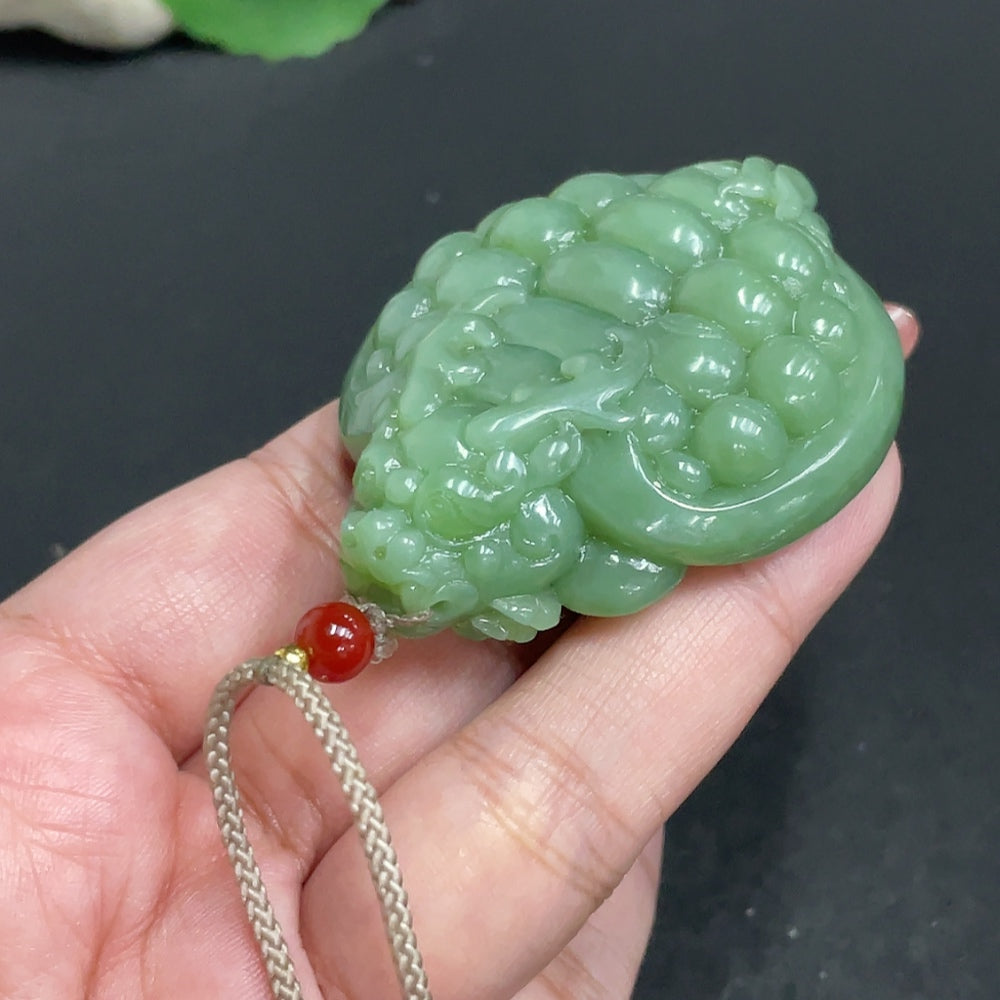 Hetian jade pendant featuring a dragon turtle design, weighing approx. 67.5g, with a rope, by HUILIU HQ.