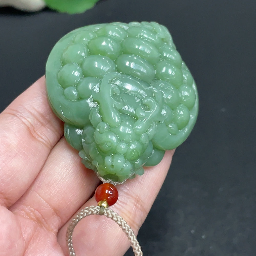 Hetian jade pendant featuring a dragon turtle design, weighing approx. 67.5g, with a rope, crafted by HUILIU HQ.