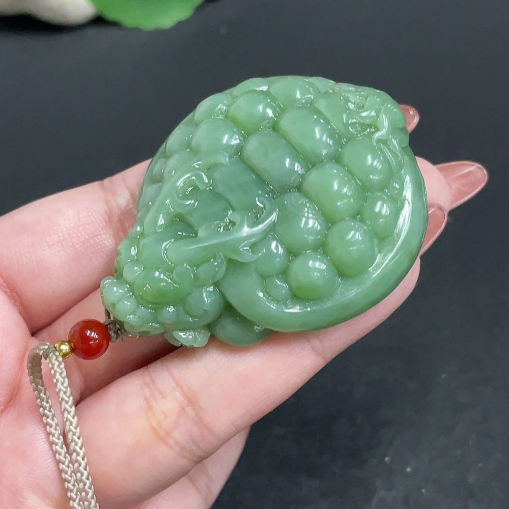 Hetian jade pendant featuring a dragon turtle design, weighing approximately 67.5g, crafted by HUILIU HQ with a rope included.
