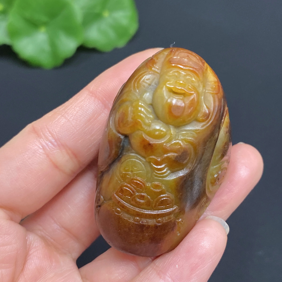 Hetian Jade Pendant featuring the God of Wealth, weighing approx. 62.2g, with natural mineral components and undetermined skin color origin.