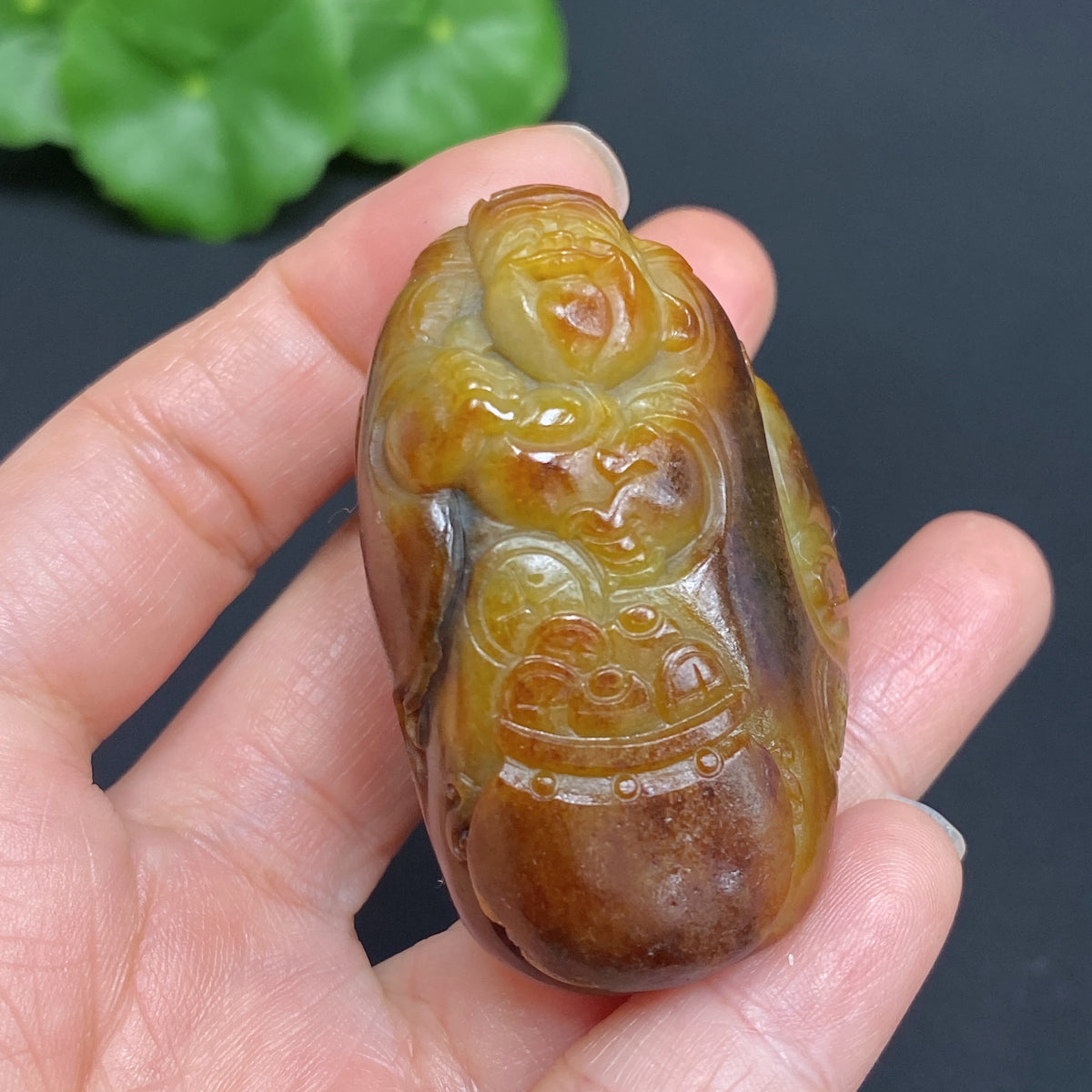 Hetian Jade Pendant featuring the God of Wealth, weighing approx. 62.2g, with natural mineral components and undetermined skin color origin.