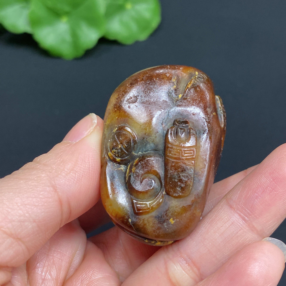 Hetian Jade Pendant with God of Wealth design, weighs approx. 62.2g, featuring natural mineral components and undetermined skin color origin.