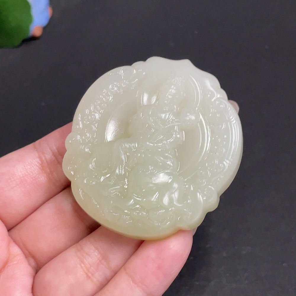 Huiliu certified Hetian jade pendant featuring Guanyin figure, smooth polished surface, and intricate carved details.