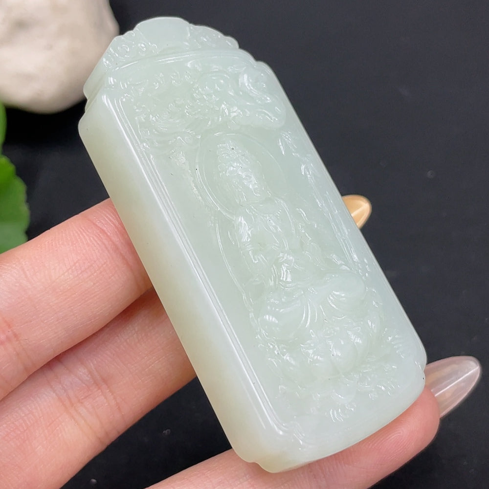 Hetian jade Guanyin pendant from HUILIU HQ, crafted in natural jade, weighs approximately 66.5g, featuring detailed carved design.