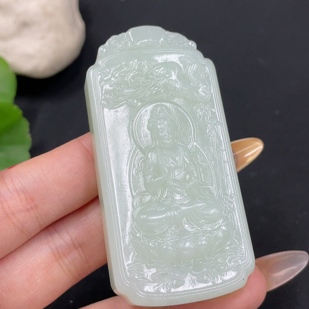 Hetian Jade Pendant featuring Guanyin figure, crafted from HUILIU HQ, weighing approximately 66.5g, showcasing intricate jade craftsmanship.