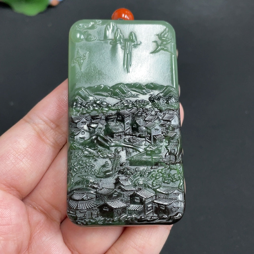 Huiliu Certified Hetian jade pendant featuring a landscape design on a rope cord, showcasing smooth, polished jade craftsmanship.