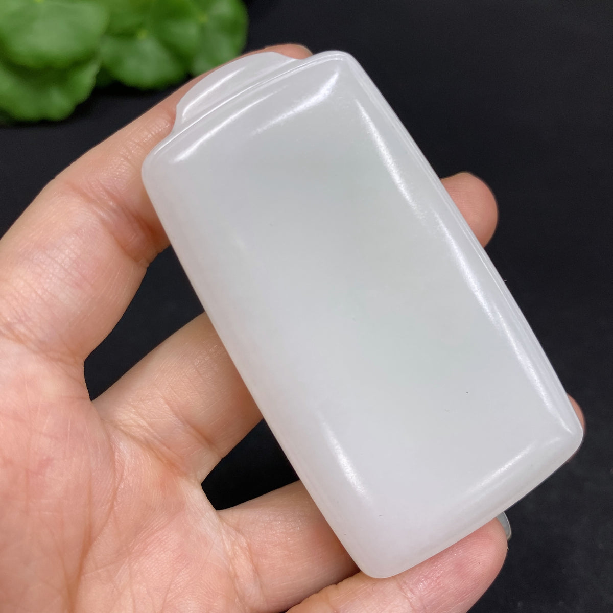 Huiliu certified Hetian jade pendant, plain jade pendant with smooth, polished surface, showcasing natural jade color and texture.