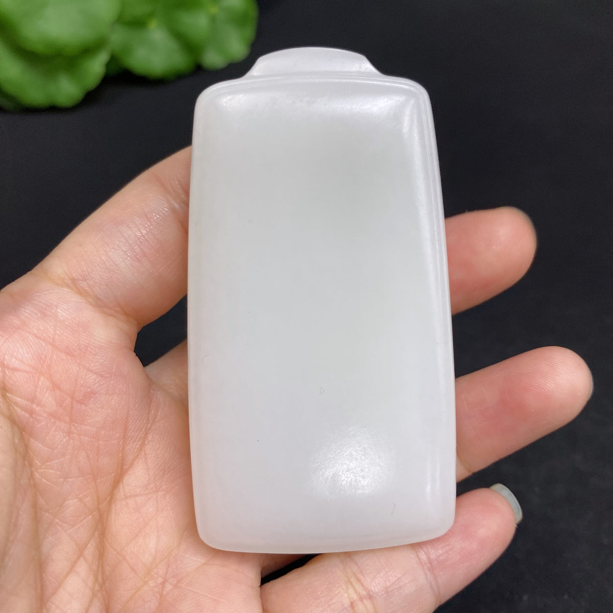 Huiliu certified Hetian jade pendant, plain oval jade jewelry piece showcasing smooth, polished green jade stone.