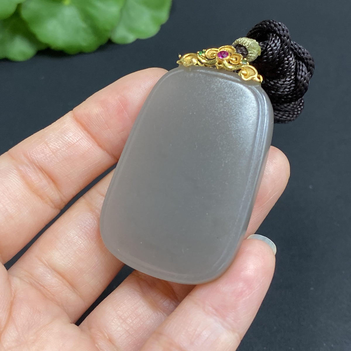 Huiliu Certified Hetian jade pendant with plain design, clasp, and included rope for jewelry wear.