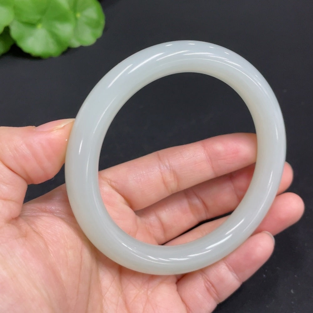 Hetian jade round bangle by HUILIU HQ, size 59.7, approximately 48g weight, showcasing smooth, polished jade craftsmanship.