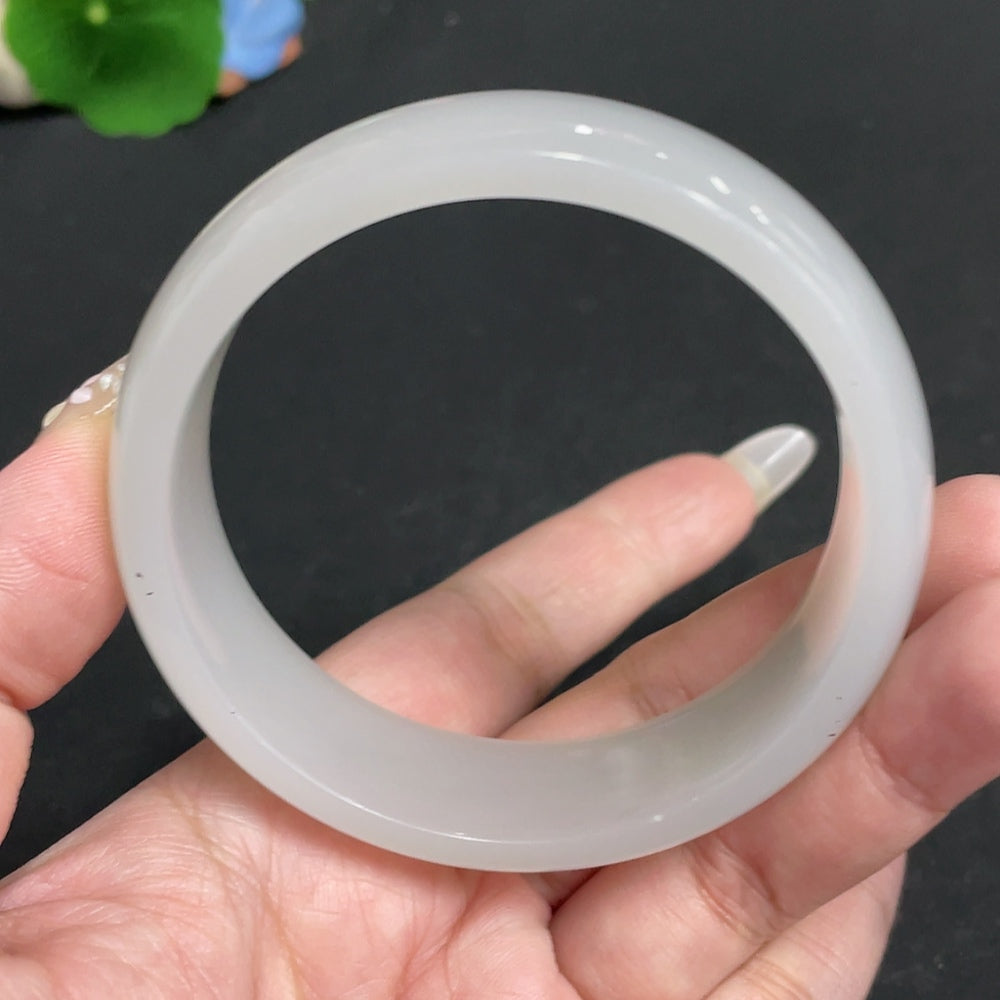Huiliu Certified Hetian Jade Round Bracelet featuring smooth, polished jade beads in a natural round design.