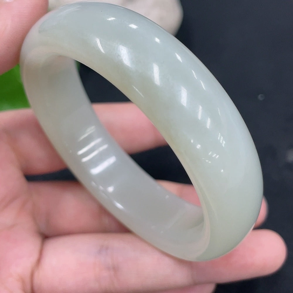 Hetian jade round bracelet by HUILIU HQ, size 54.3mm, weighing about 64.7g, featuring smooth polished jade beads.