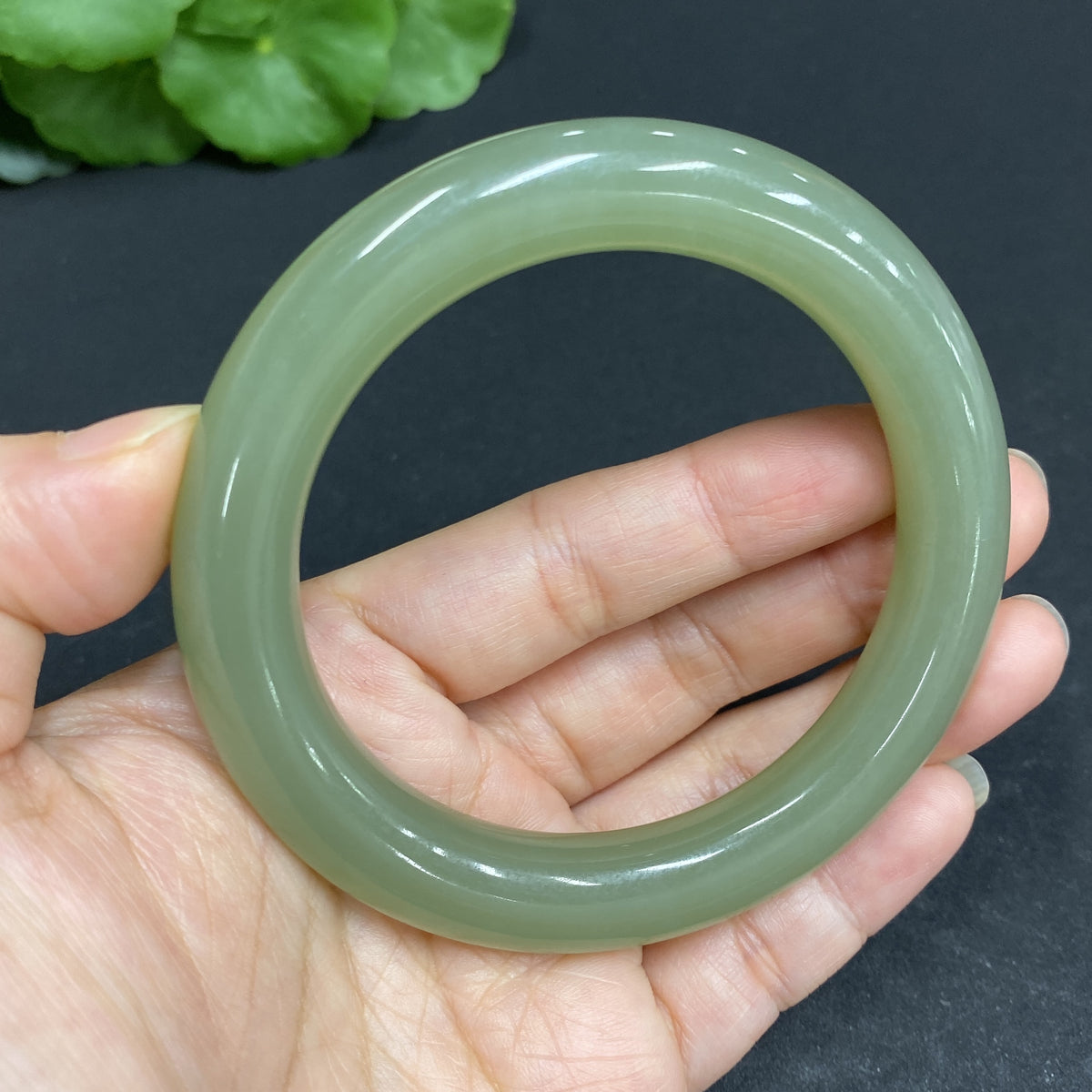 Hetian Jade round bracelet by HUILIU HQ, size 57, weighs approximately 60.2g, featuring smooth, polished jade beads.