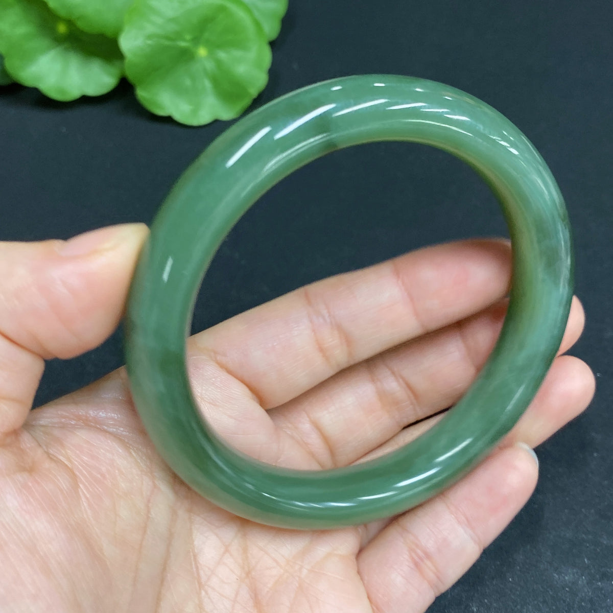 Huiliu HQ Hetian Jade round bracelet, size 59.1, lightweight and smooth, showcasing elegant green jade beads.