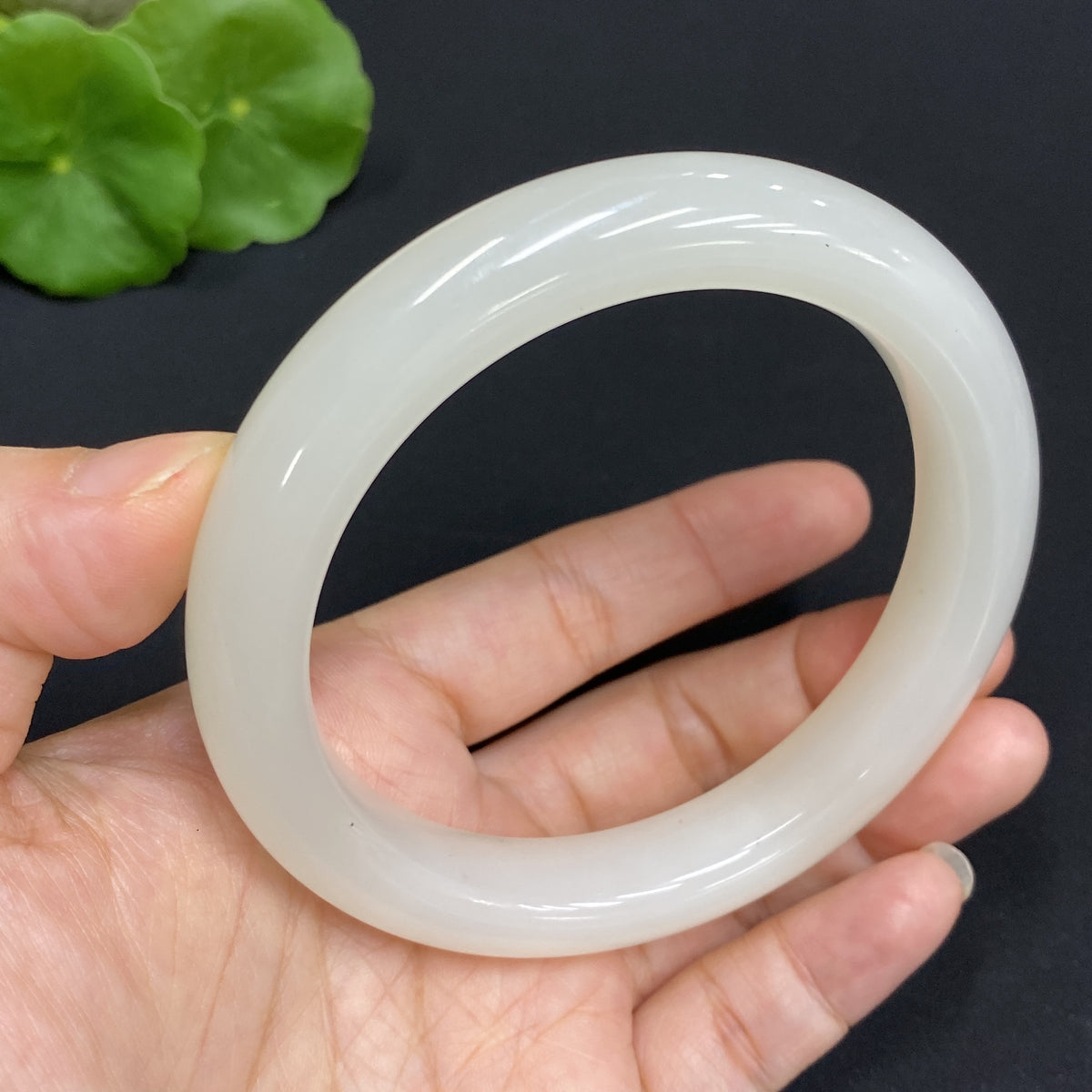 Hetian Jade round bracelet by HUILIU HQ, size 60.9 with a total weight of 63.7 grams, showcasing smooth, polished jade beads.