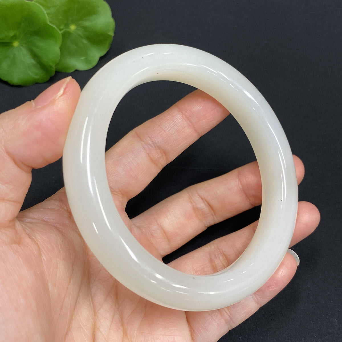 Hetian Jade round bracelet by HUILIU HQ, size 60.9 with approx. 63.7g weight, showcasing smooth, polished jade beads.