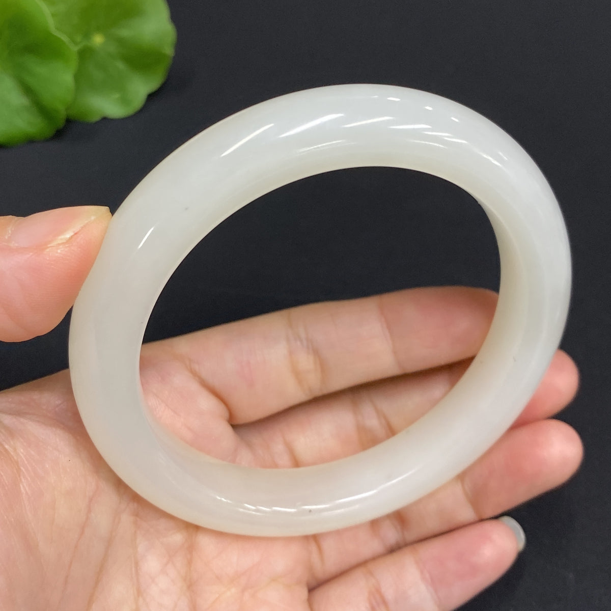 Hetian jade round bracelet by HUILIU HQ, 60.9mm size, approximately 63.7g, showcasing smooth, polished jade beads.