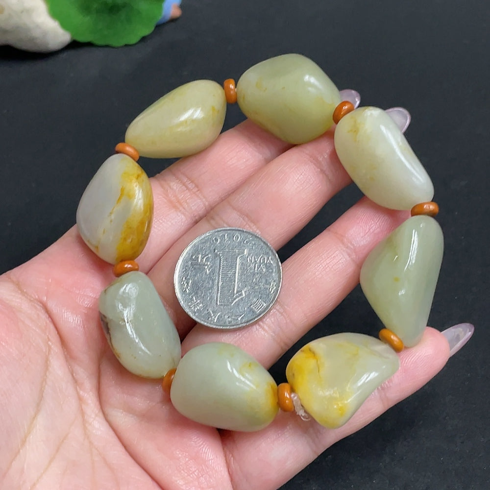 HUILIU HQ Hetian Jade Seed Material Bracelet with undetermined skin color formation, weighs approximately 99.3g, showcasing smooth jade beads.