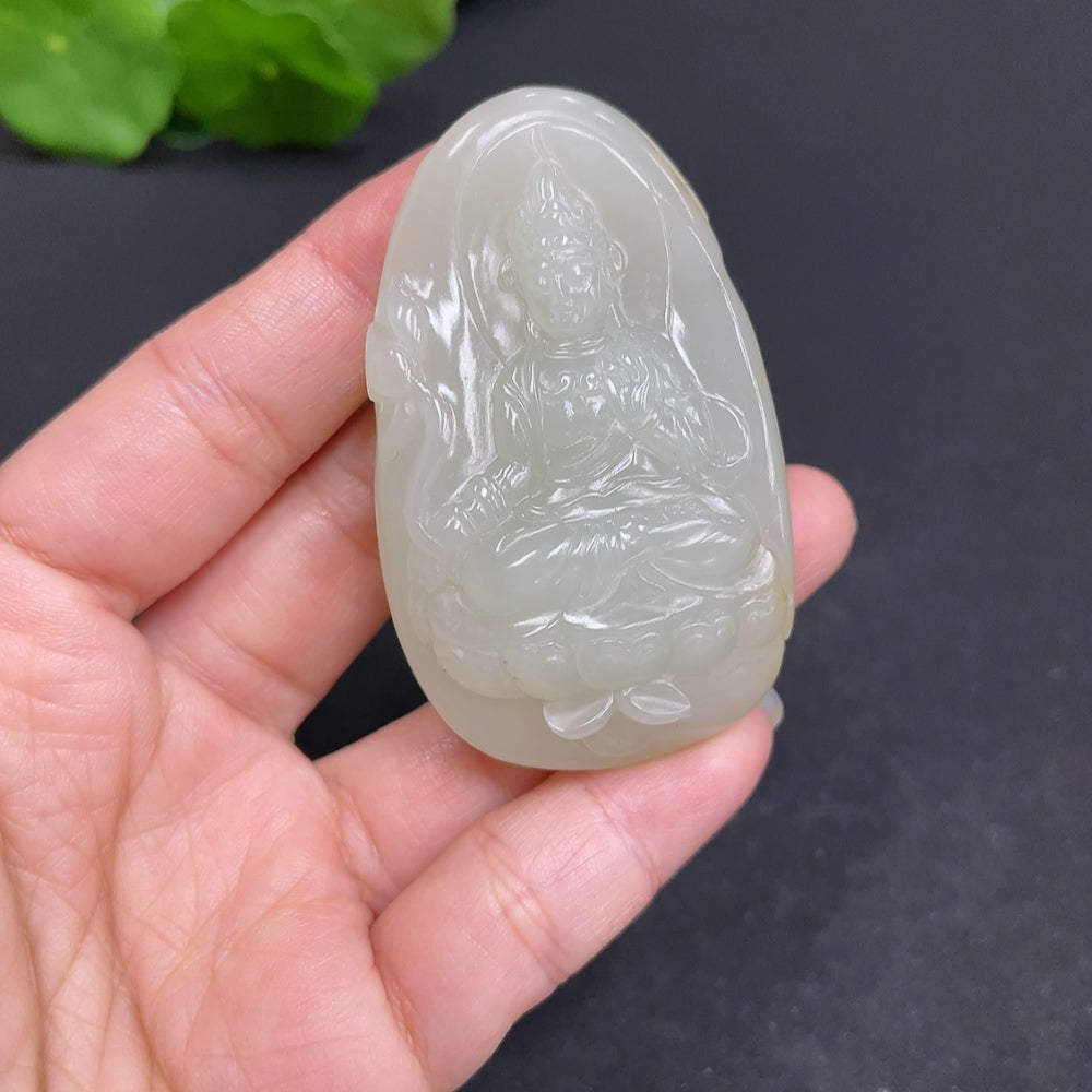 Hetian Jade Seed Guanyin pendant from HUILIU HQ, approximately 45.7g, featuring detailed carved figure on smooth jade surface.