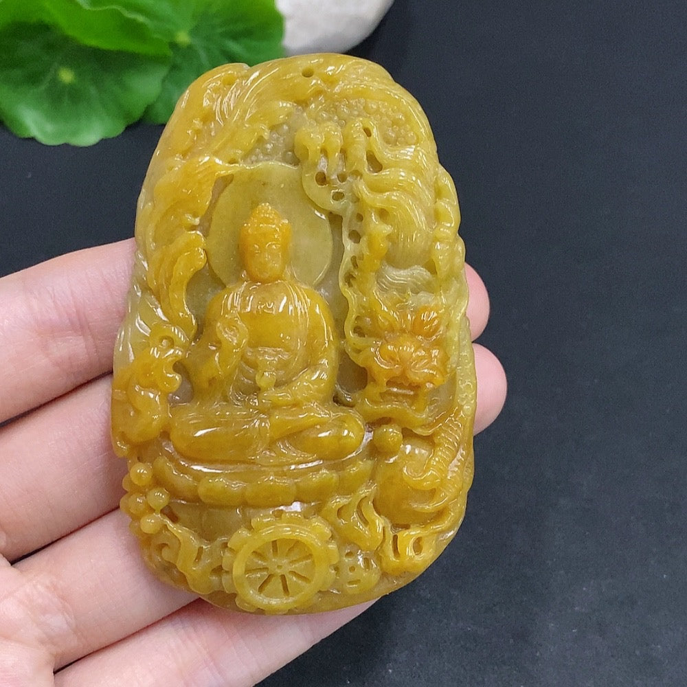 Jadeite Amitabha pendant from HUILIU HQ, featuring a carved jade Buddha figure on a smooth green jade pendant.